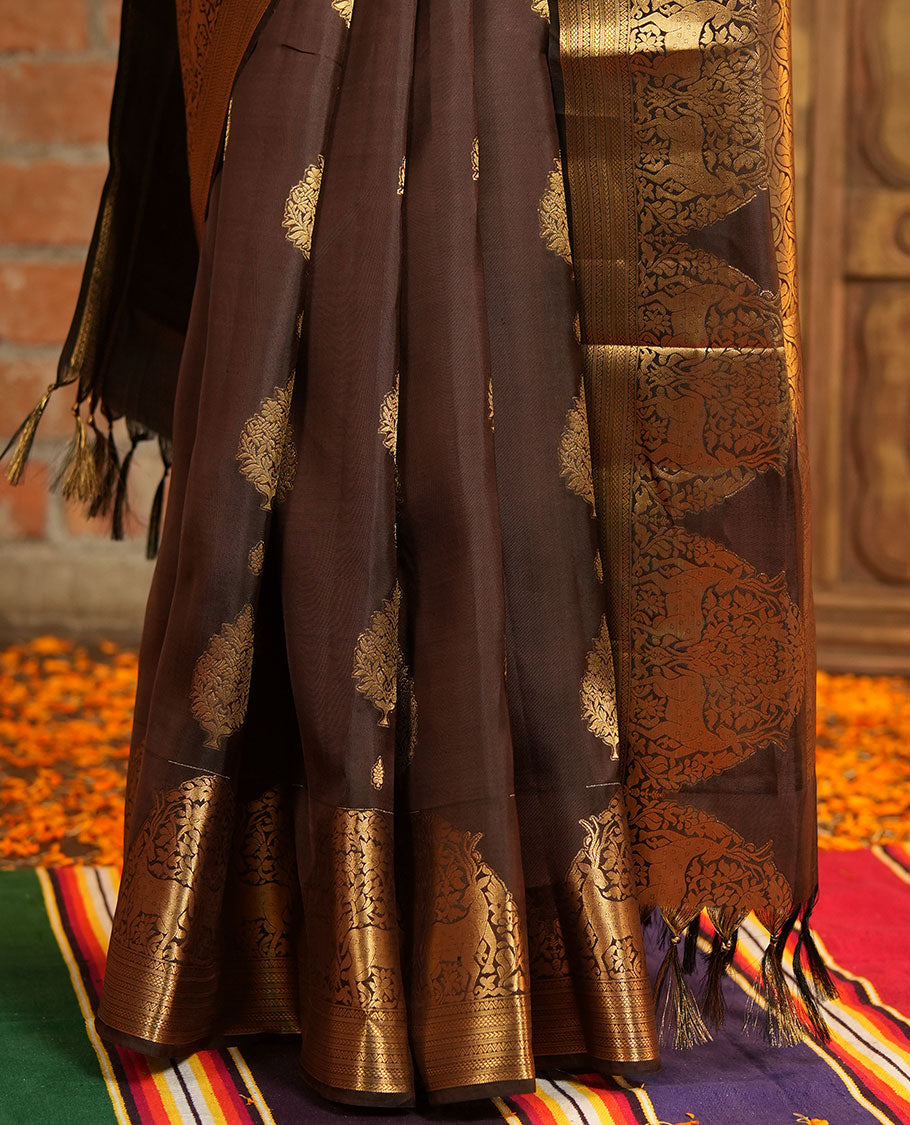 Brown Vasundhara Lite-Silk Mix Saree, Elevated with Zari Buttas All Over Its Body, Highlighted by Zari Border of Neli, Kuyil Kann, Kathir, and Maan Designs, Gracefully Embellished Pallu of Jaal Design, and Paired with a Matching Blouse