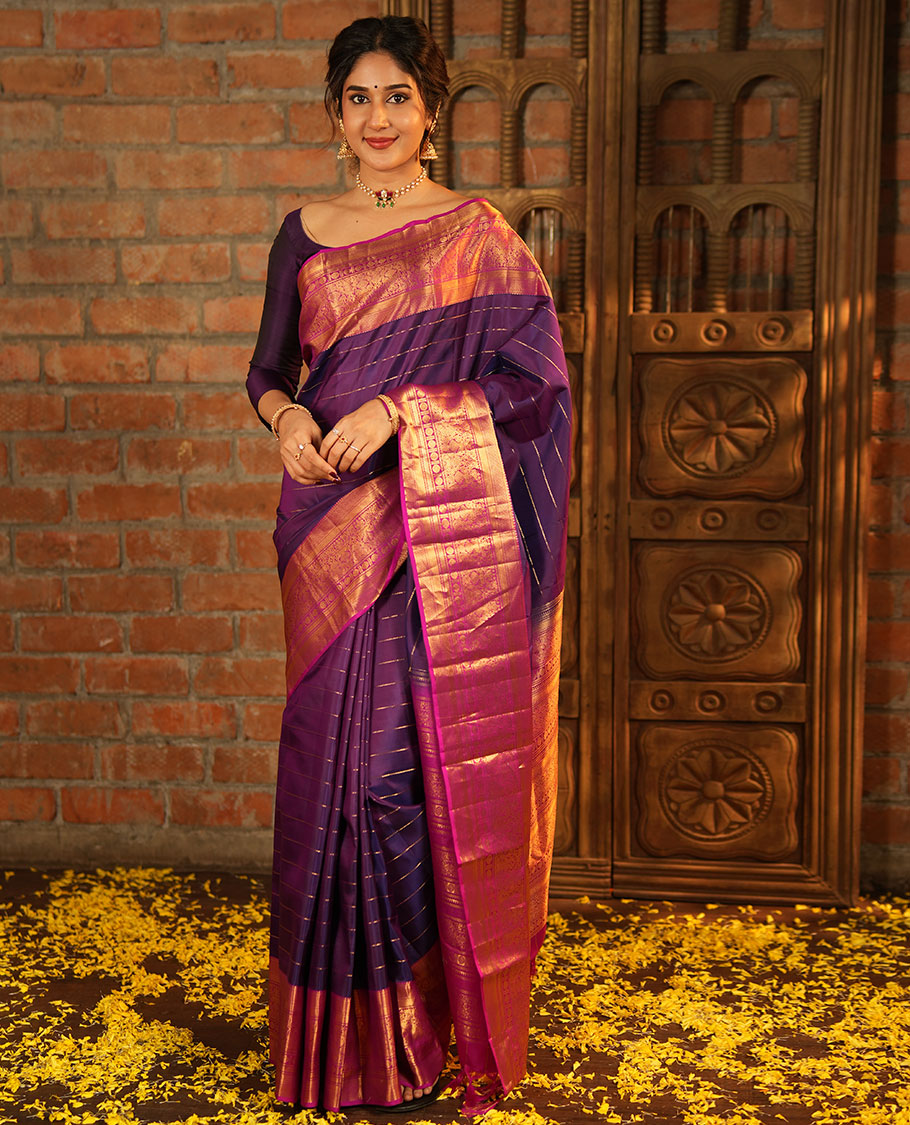 Purple Vasundhara Silk Saree, Enriched with Neli Stripes On Its Body, Complemented by Captivating Contrast Border of Mayil Kann, Vanki, Iru Thalaipakshi, Chakram, and Neli Designs, Grand Pallu, and Paired with a Contrast Blouse