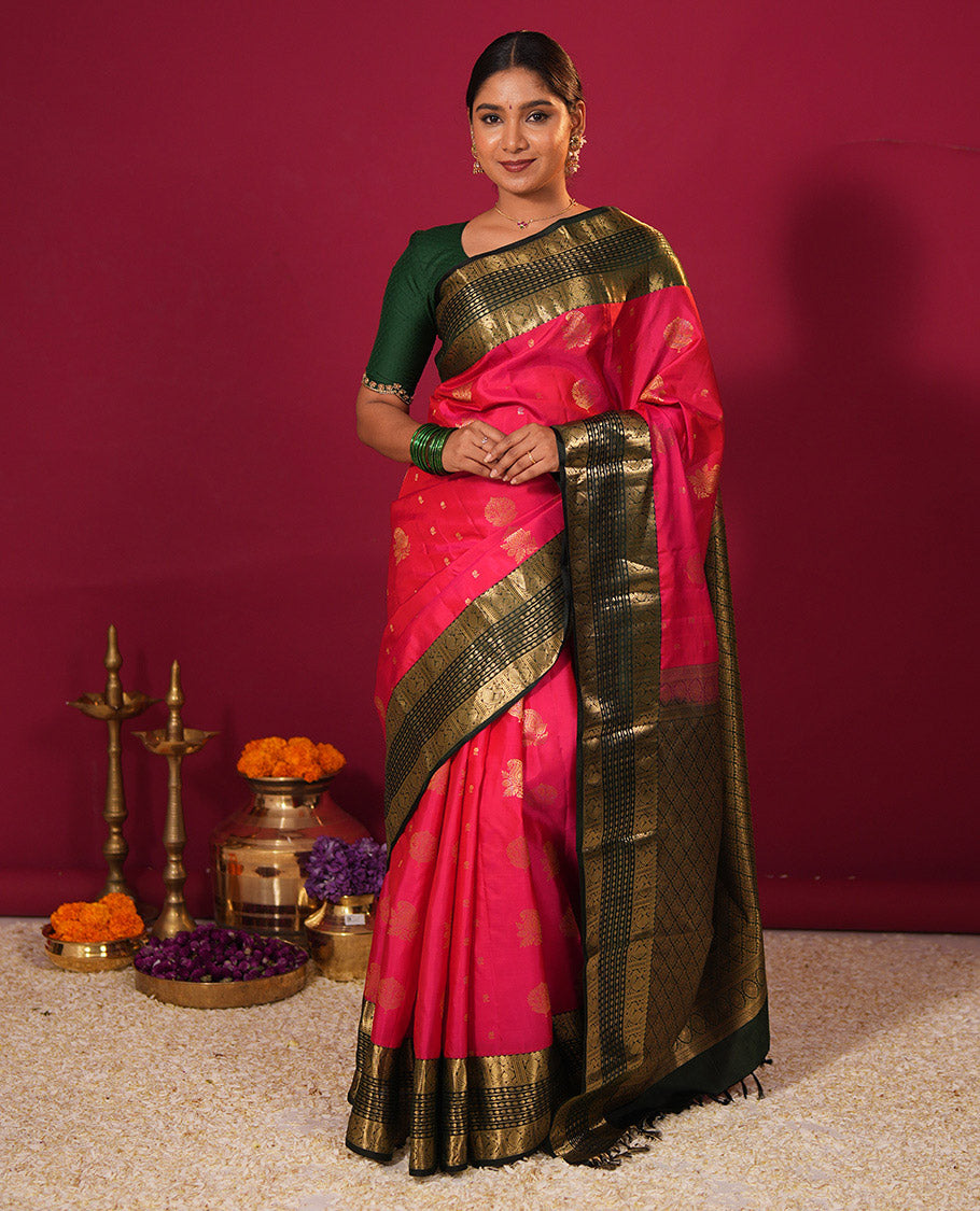 Tomato red zari buttas silk saree, contrast border of thilakam mokku, banaras, thilakam, and mayil designs, and zari-rich jaal design