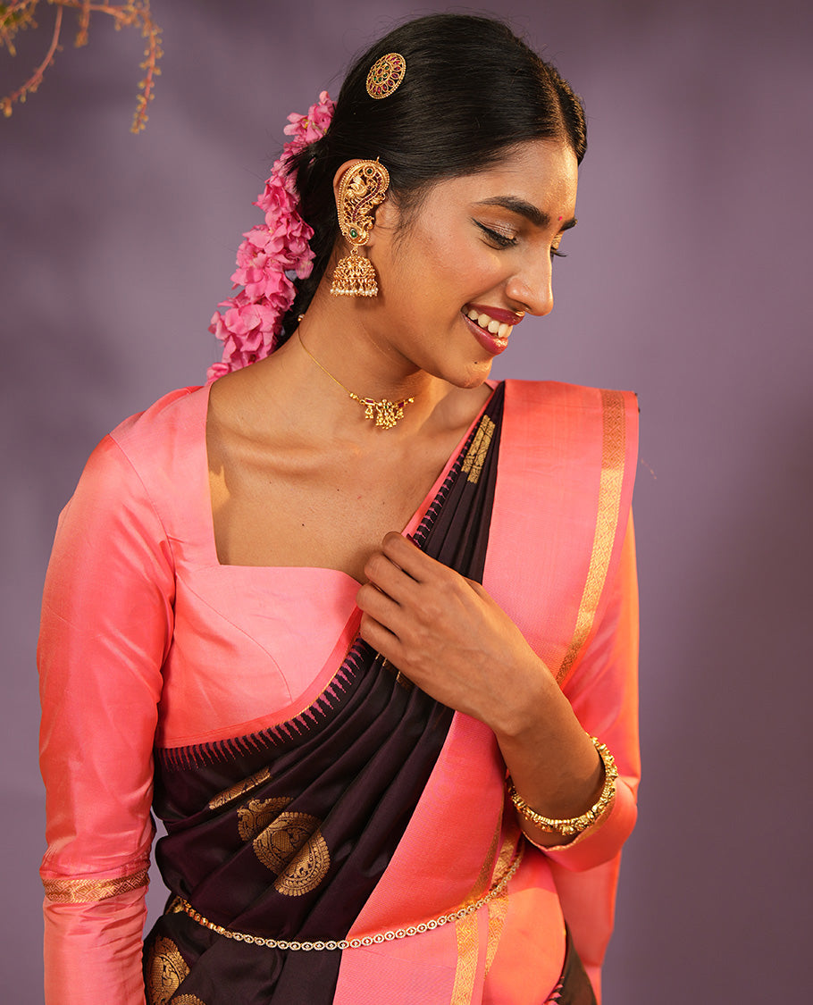 Coffee Brown Vasundhara Silk Saree Accentuated with Round Mayil Buttas, Complemented with Contrast Rettai Pettu Thazampoo Rekku Zari Border, Beautifully Woven Pallu of Jaal Design, and Paired with a Contrast Blouse