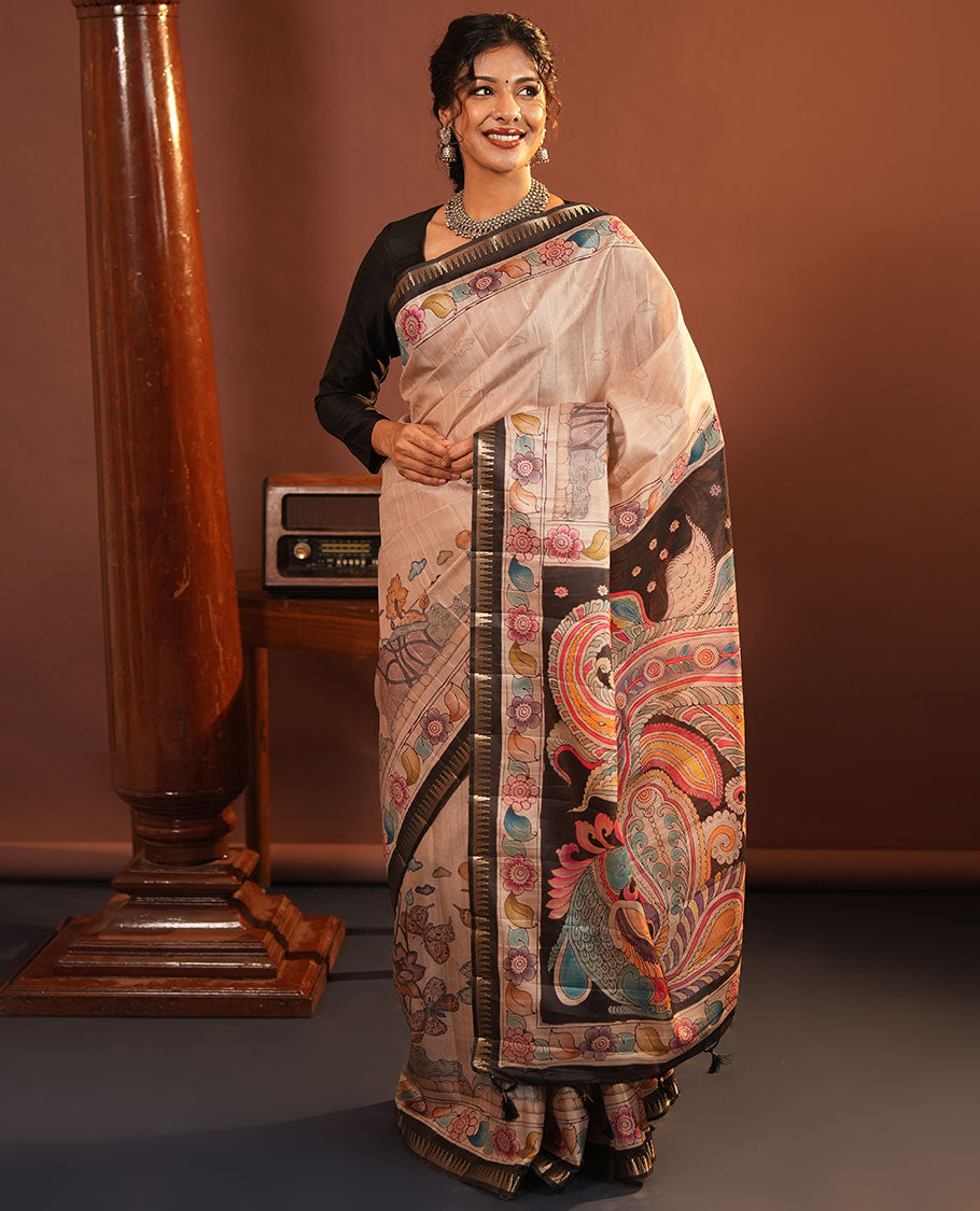Chikku-Black Fancy Tussar Saree, Artfully Detailed with Kalamkari-Style Floral Print Across Its Body, Complemented by Contrast Temple Zari Border, a Colourfully Kalamkari Printed Pallu, and Paired with a Plain Blouse