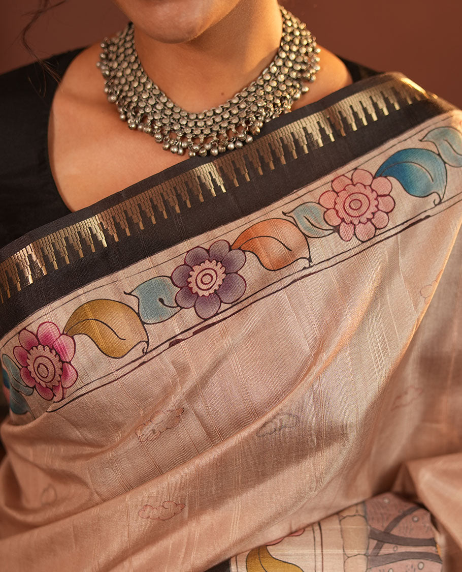 Chikku-Black Fancy Tussar Saree, Artfully Detailed with Kalamkari-Style Floral Print Across Its Body, Complemented by Contrast Temple Zari Border, a Colourfully Kalamkari Printed Pallu, and Paired with a Plain Blouse