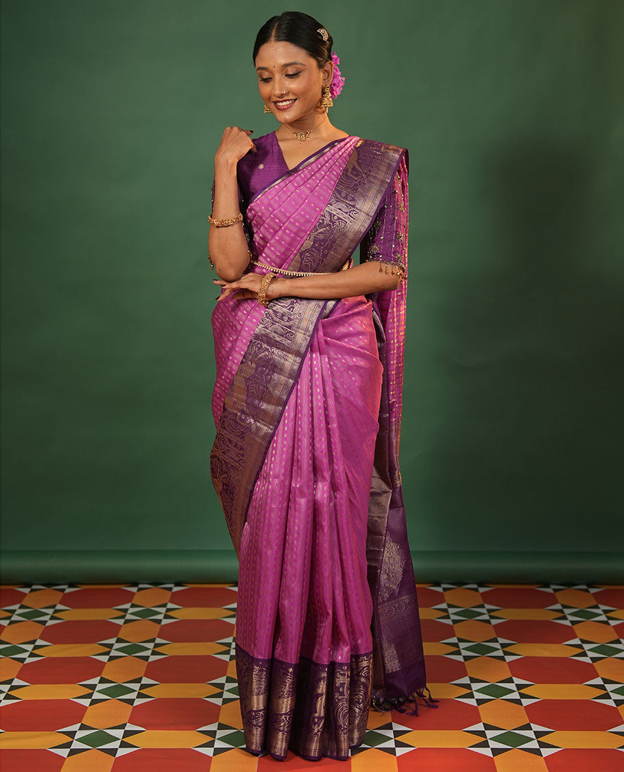 Onion Pink Vasundhara Silk Saree Delicately Woven with Varai Oosai and Rudraksham Buttas, Captivating Contrast Kuthirai Motifs Zari Woven Border, Intricately Designed Pallu, and Paired with a Contrast Blouse