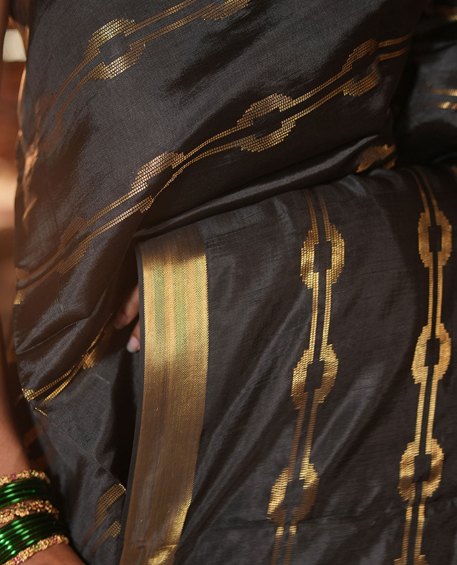Black Banana Pith Saree, Elevated with Zari Stripes, a Zari Border, Zari Woven Pallu, and a Matching Blouse