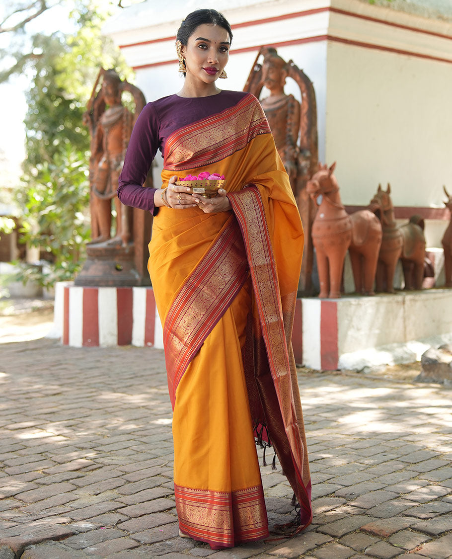 Yellow Plain Vasundhara Lite Silk Saree, Complemented by a Contrast Border of Banaras, Diamond, Muthu, Kathir, and Round Mayil Designs, Grand Jaal Pallu, and Paired with a Contrast Blouse