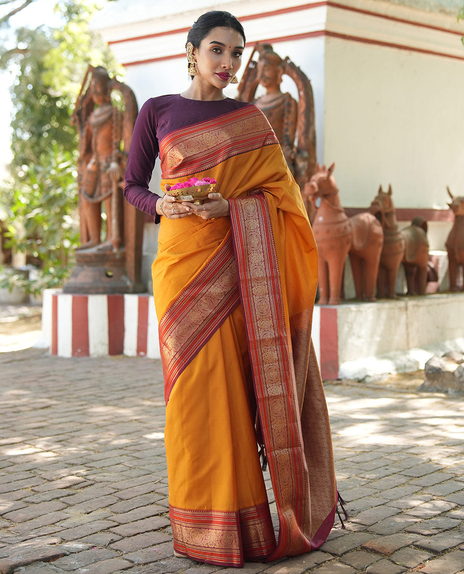 Yellow Plain Vasundhara Lite Silk Saree, Complemented by a Contrast Border of Banaras, Diamond, Muthu, Kathir, and Round Mayil Designs, Grand Jaal Pallu, and Paired with a Contrast Blouse