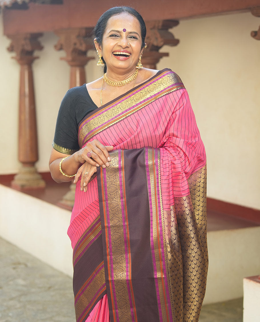 Pink Vasundhara Lite Silk Saree, Subtly Detailed with Thread and Zari Stripes, Complemented by Contrast Rettai Pettu Border of Salngai, Cross Kamalam, Muthu, Kathir, Diamond, and Arumbu Manga Designs, Grand Jaal Pallu, and Paired with a Contrast Blouse