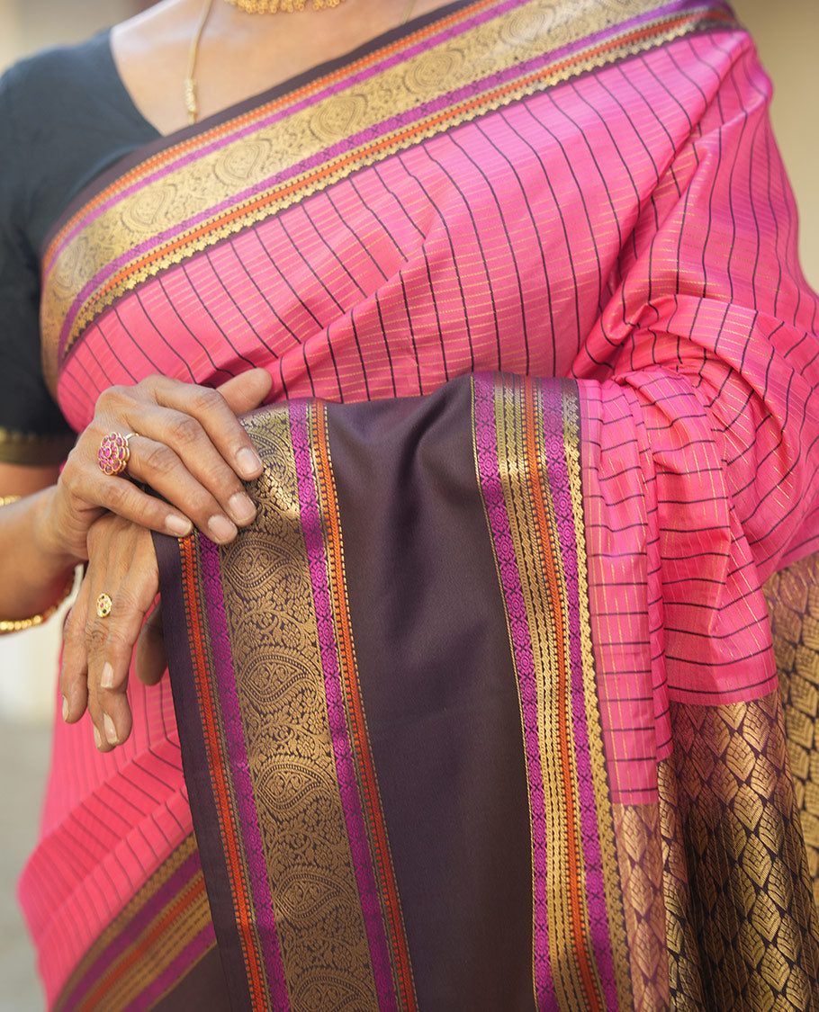 Pink Vasundhara Lite Silk Saree, Subtly Detailed with Thread and Zari Stripes, Complemented by Contrast Rettai Pettu Border of Salngai, Cross Kamalam, Muthu, Kathir, Diamond, and Arumbu Manga Designs, Grand Jaal Pallu, and Paired with a Contrast Blouse