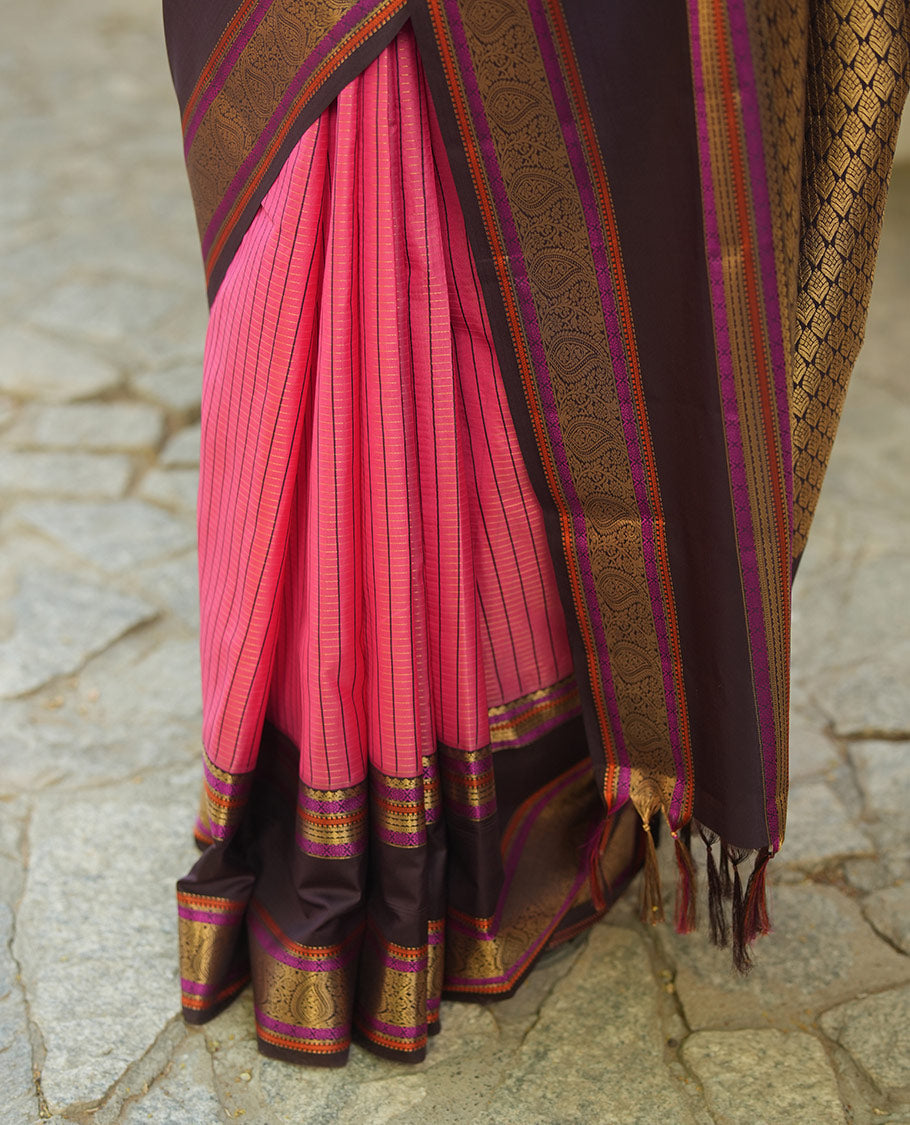 Pink Vasundhara Lite Silk Saree, Subtly Detailed with Thread and Zari Stripes, Complemented by Contrast Rettai Pettu Border of Salngai, Cross Kamalam, Muthu, Kathir, Diamond, and Arumbu Manga Designs, Grand Jaal Pallu, and Paired with a Contrast Blouse