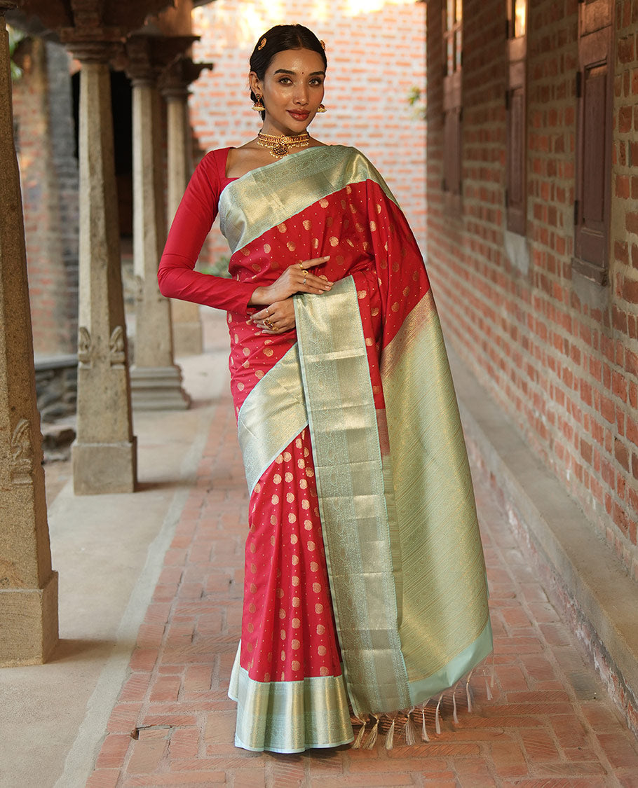 Red BudgetSilk Saree, Spotlighted with Zari Buttas All Over Its Body, Complemented by a Contrast Border of Banaras, Muthu, Kodi Visiry and Kodi Manga Designs, Pallu Steeped with Kodi Manga Designs, and Paired with a Contrast Blouse