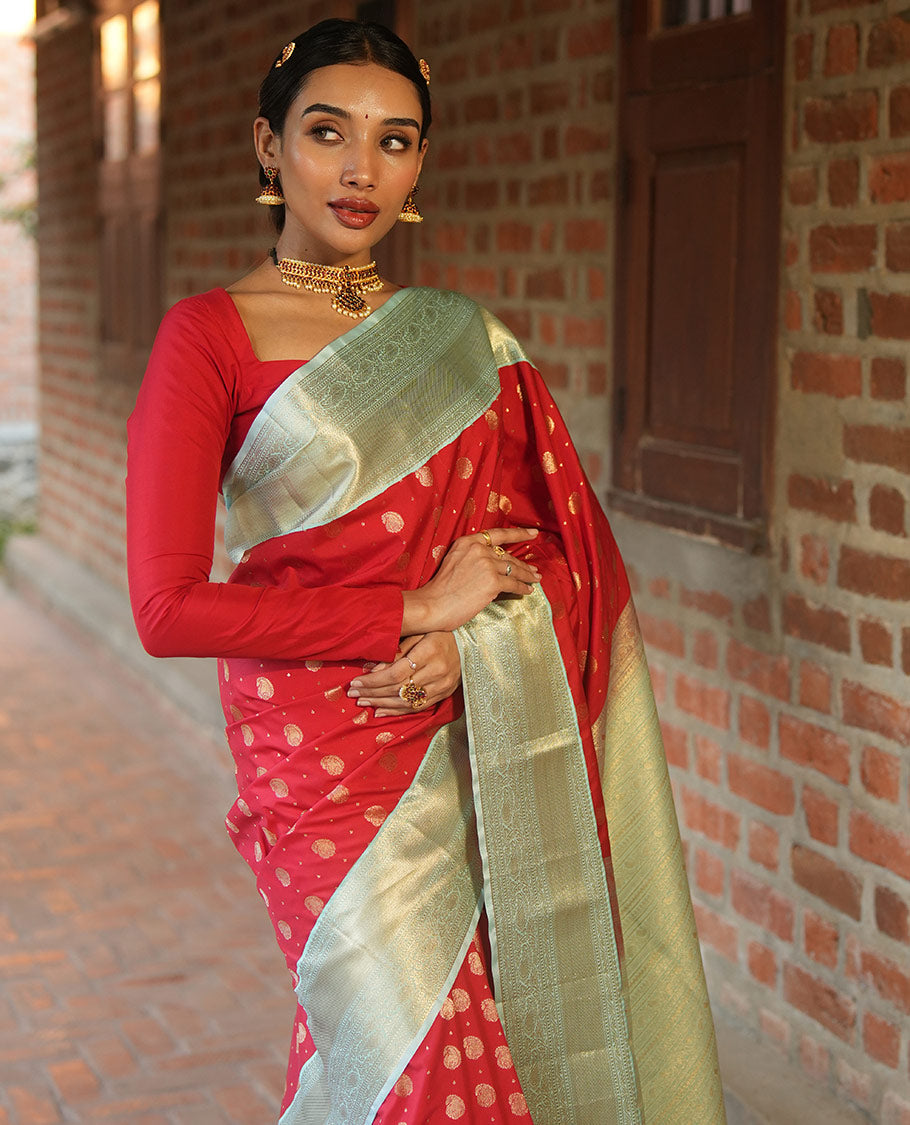 Red BudgetSilk Saree, Spotlighted with Zari Buttas All Over Its Body, Complemented by a Contrast Border of Banaras, Muthu, Kodi Visiry and Kodi Manga Designs, Pallu Steeped with Kodi Manga Designs, and Paired with a Contrast Blouse