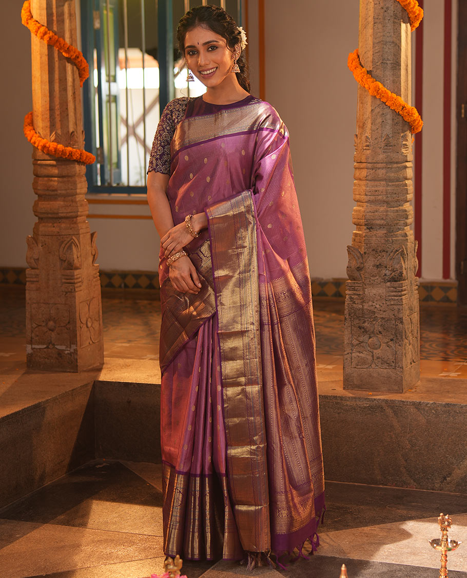 Pink Vasundhara Silk Saree, Elevated with Zari Stripes and Chakram Buttas All Over Its Body, Complemented by a Contrast Border of Rekku, Muthu, Kamalam and Mayil Kann Designs, Grand Geometric Patterned Pallu, and Paired with a Contrast Blouse