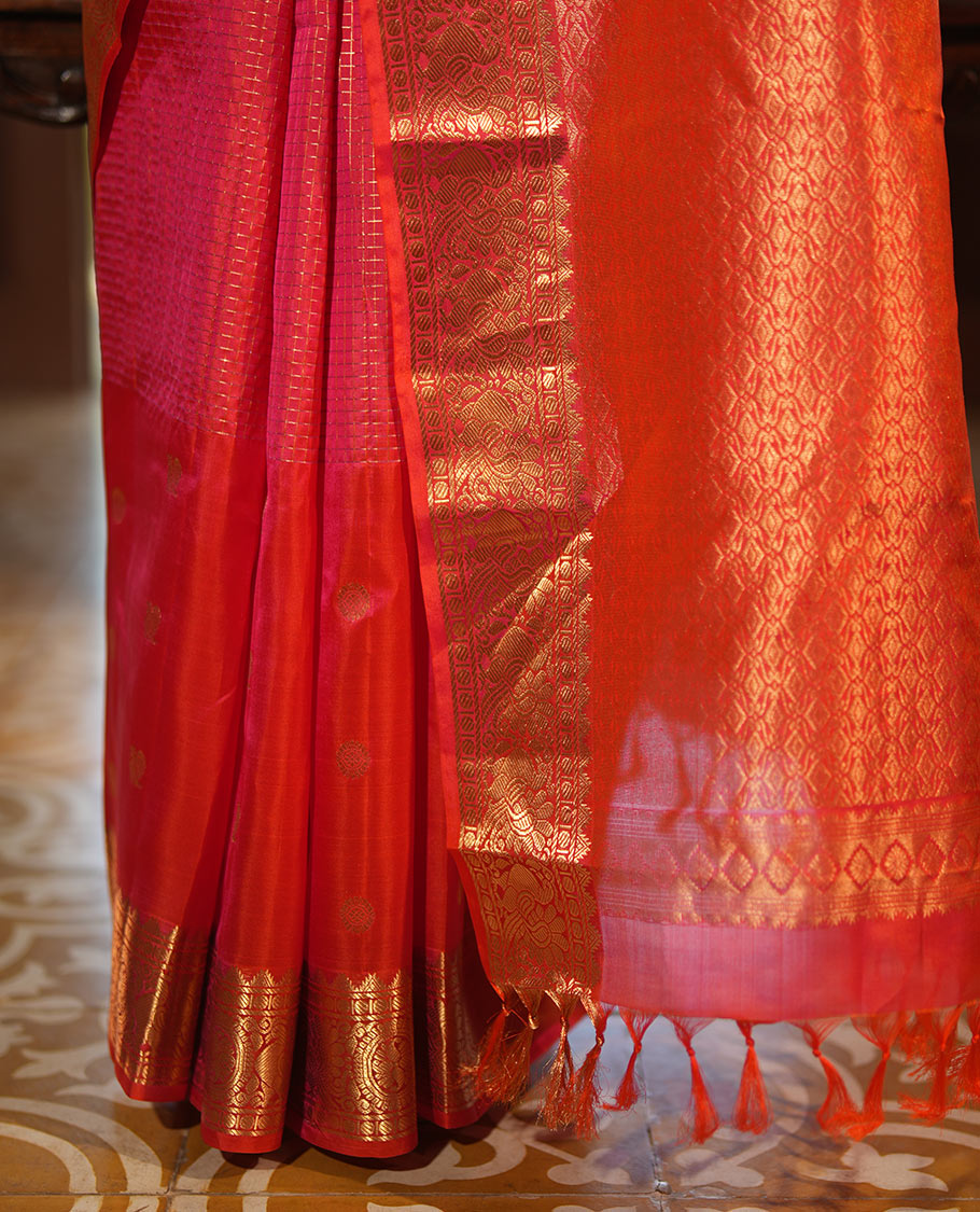 Pink Vasundhara Lite Silk Mix Saree, Artfully Detailed with Mayil-Chakram Buttas and Zari Checks All Over Its Body, Highlighted by a Zari Border of Thazampoo Rekkum, Paisa, Mayil, and Chakram Designs, a Grand Pallu, and Paired with a Matching Blouse