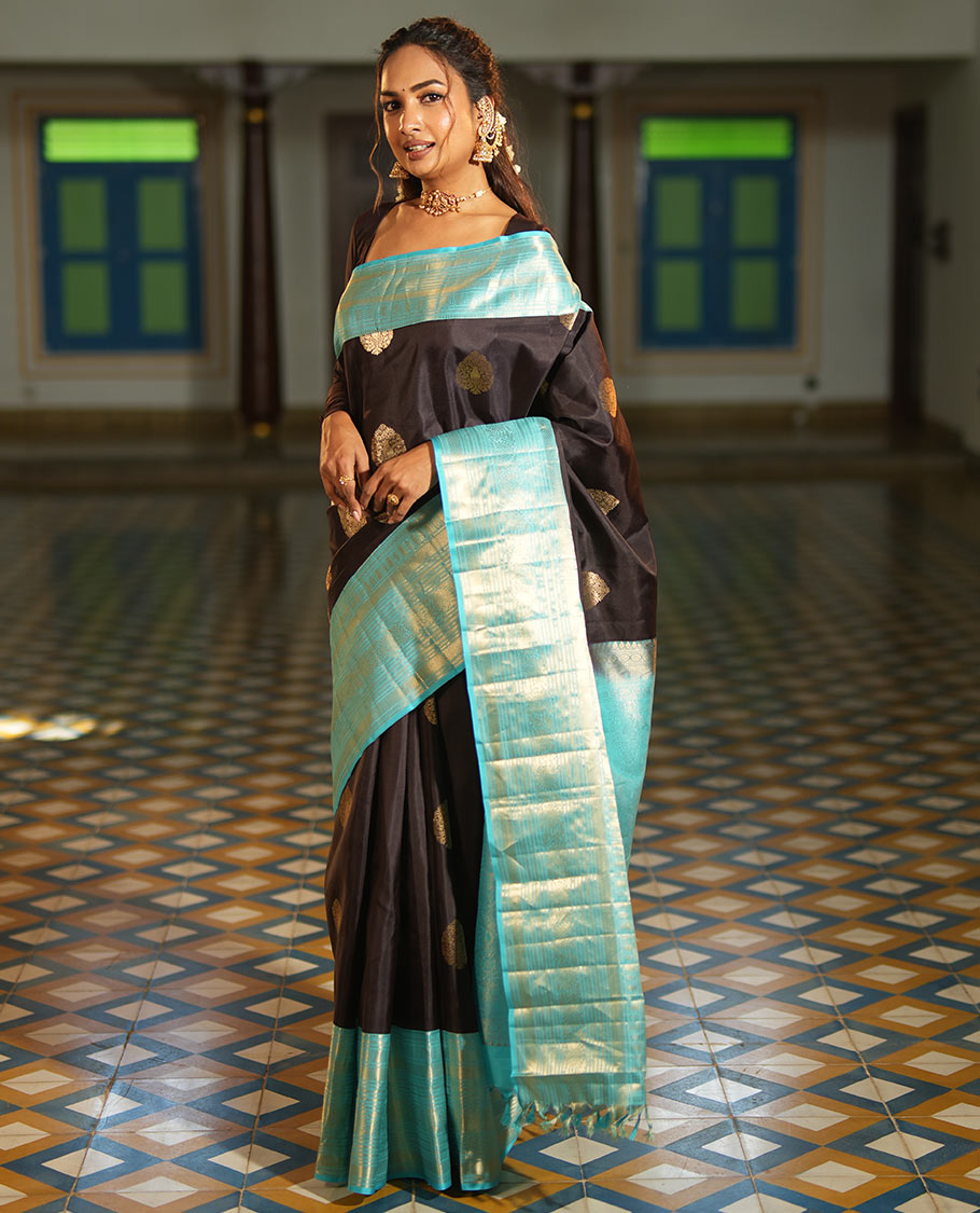 Brown Vasundhara Silk Saree, Spotlighted with Zari Buttas All Over Its Body, Complemented by a Contrast Border of Kodi Visiry Designs, a Grand Pallu, and Paired with a Contrast Blouse