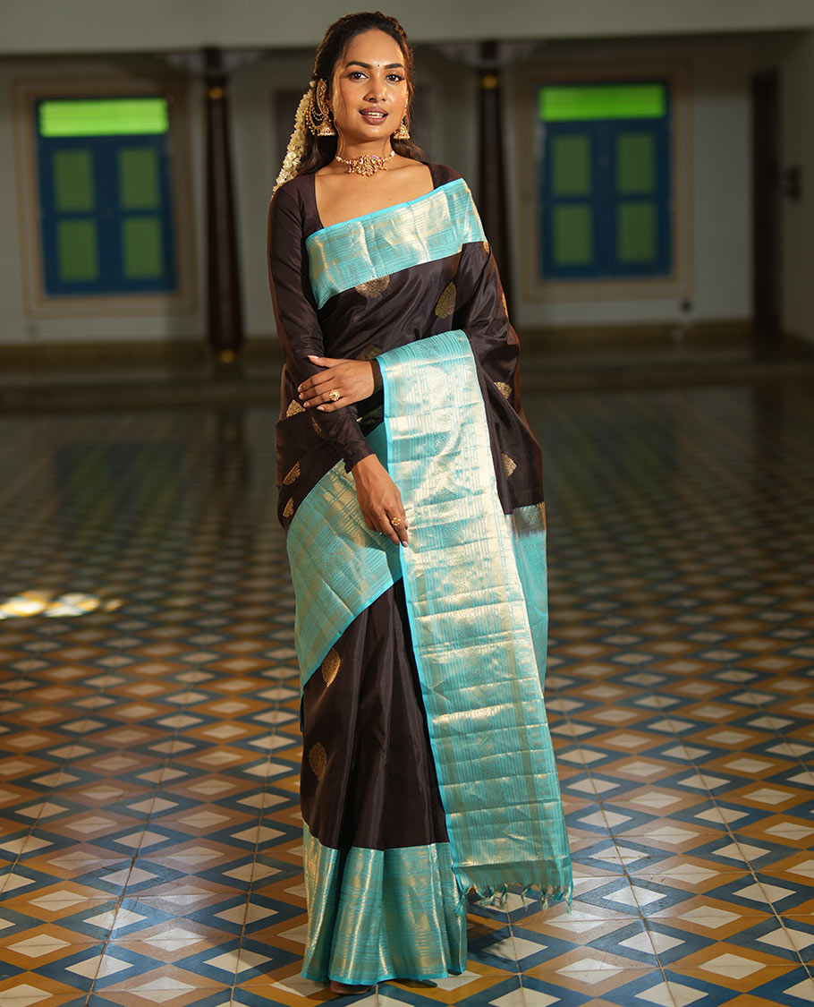 Brown Vasundhara Silk Saree, Spotlighted with Zari Buttas All Over Its Body, Complemented by a Contrast Border of Kodi Visiry Designs, a Grand Pallu, and Paired with a Contrast Blouse