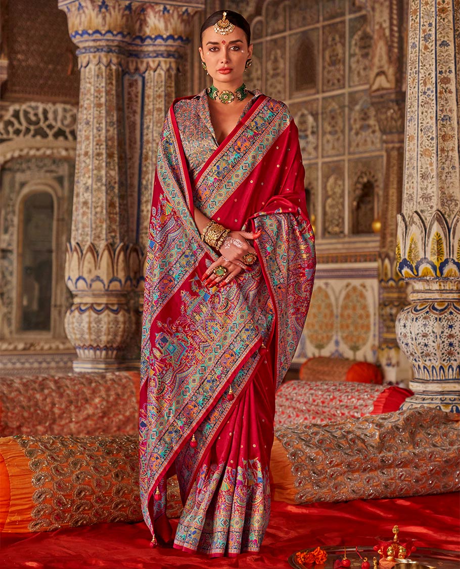 Red meena buttas designer catalog saree, contrast meenakari border of human and elephant motifs, and wedding theme meenakari pallu