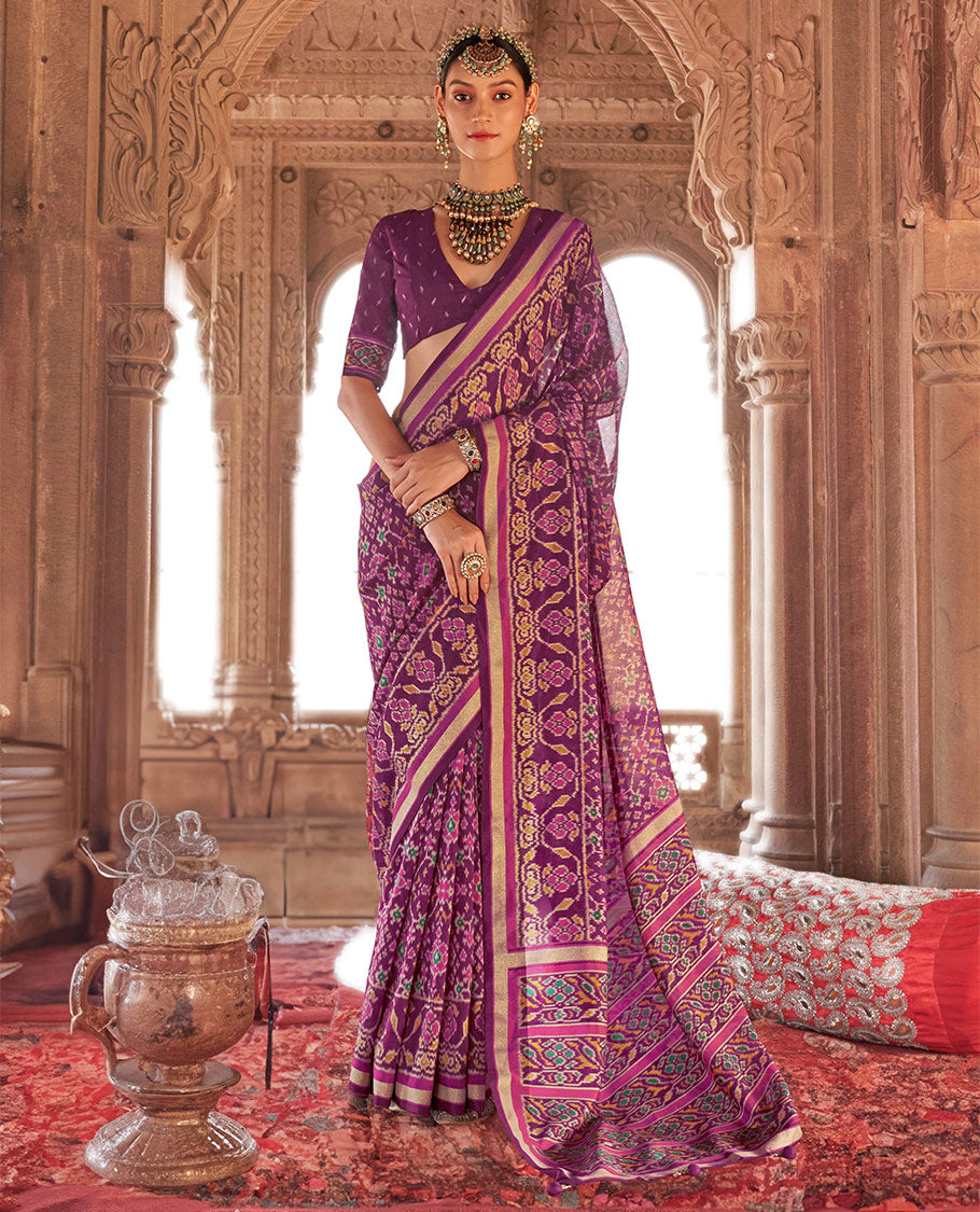 Purple Ikat Patola Designer Saree, Decked Up with Intricate Ikat Designs, Highlighted by Intricate Ikat Border, Intricate Pallu, and a Matching Blouse