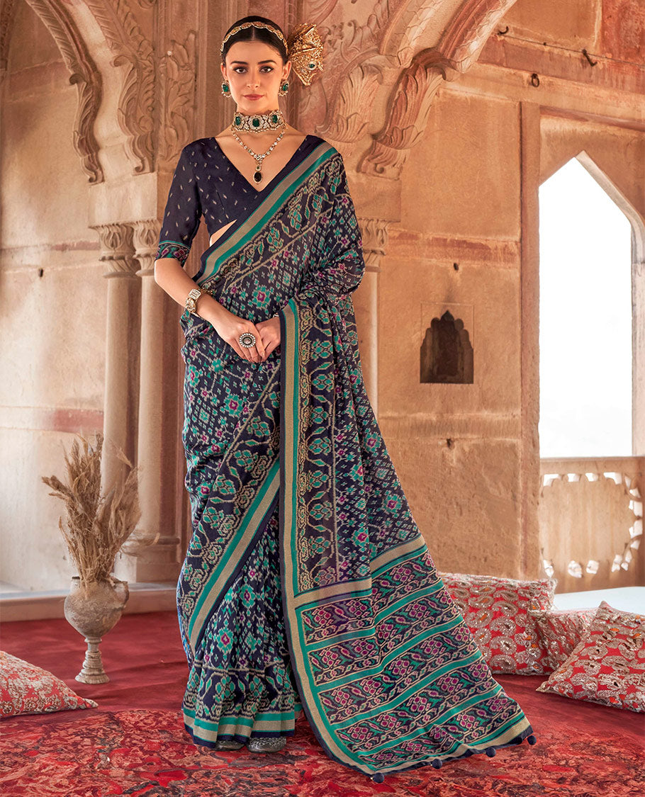 Navy Blue Ikat Patola Designer Saree, Detailed with Intricate Ikat Designs, Highlighted by Intricate Ikat Border, Intricate Pallu, and a Matching Blouse