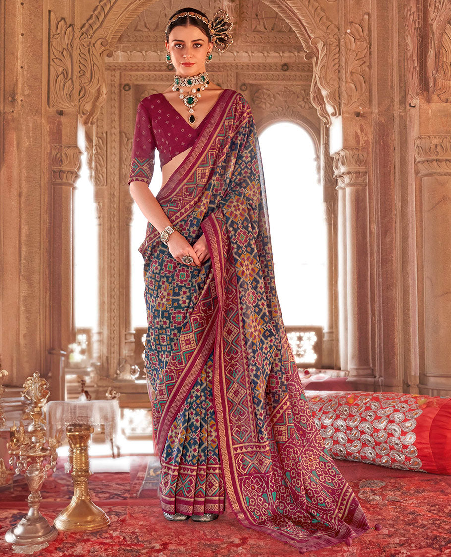 Blue Ikat Patola Designer Saree, Adorned with Intricate Ikat Designs, Complemented by a Contrast Ikat Border, Intricate Pallu, and a Contrast Blouse