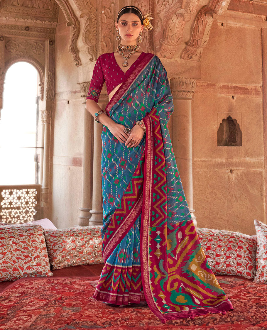 Blue Ikat Patola Designer Saree, Highlighted by Geometric Ikat Designs, Complemented by a Contrast Ikat Border, Intricate Pallu, and a Contrast Blouse