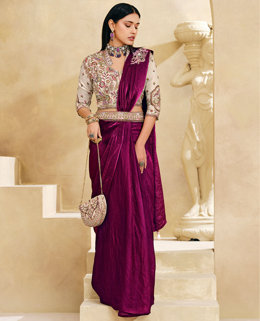 Maroon Plain Party Wear Designer Saree, Complemented with a Contrast Round Neck Heavy Embroidered 3/4th Sleeve Readymade Blouse, Detachable Embroidered Belt, and a Free Embroidered Flap Sling Bag