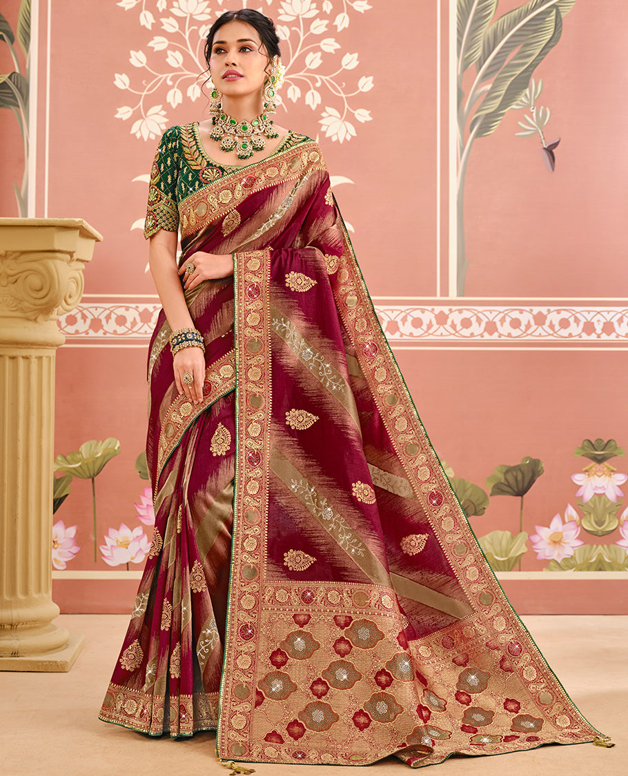 Maroon Dola Silk Designer Catalog Saree with Buttas and Floral Creeper, a Contrast Embroidered Blouse