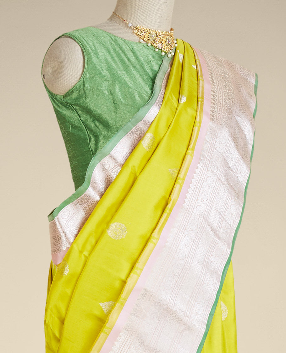Green gadwal silksaree with zari buttas, contrast vidarbha border of traditional zari designs & pallu of jaal designs