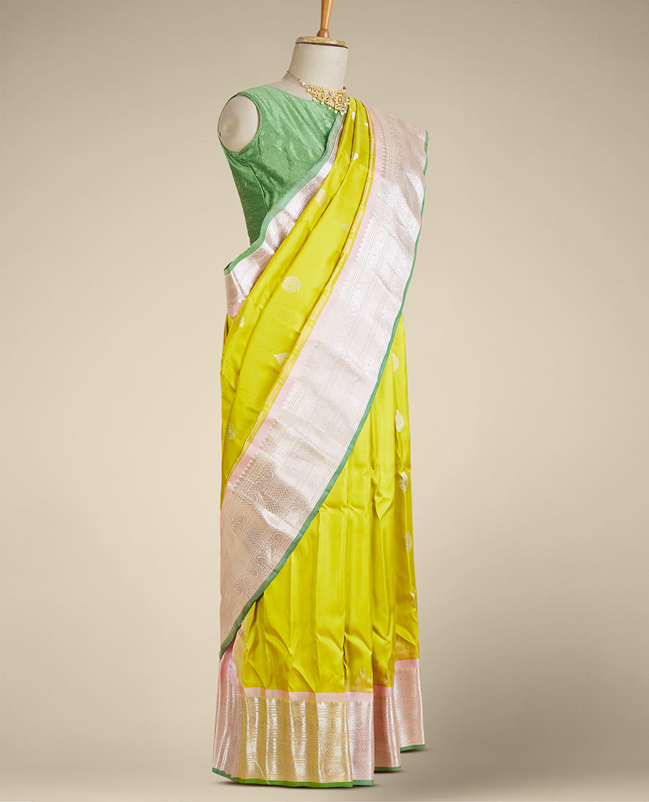 Green gadwal silksaree with zari buttas, contrast vidarbha border of traditional zari designs & pallu of jaal designs