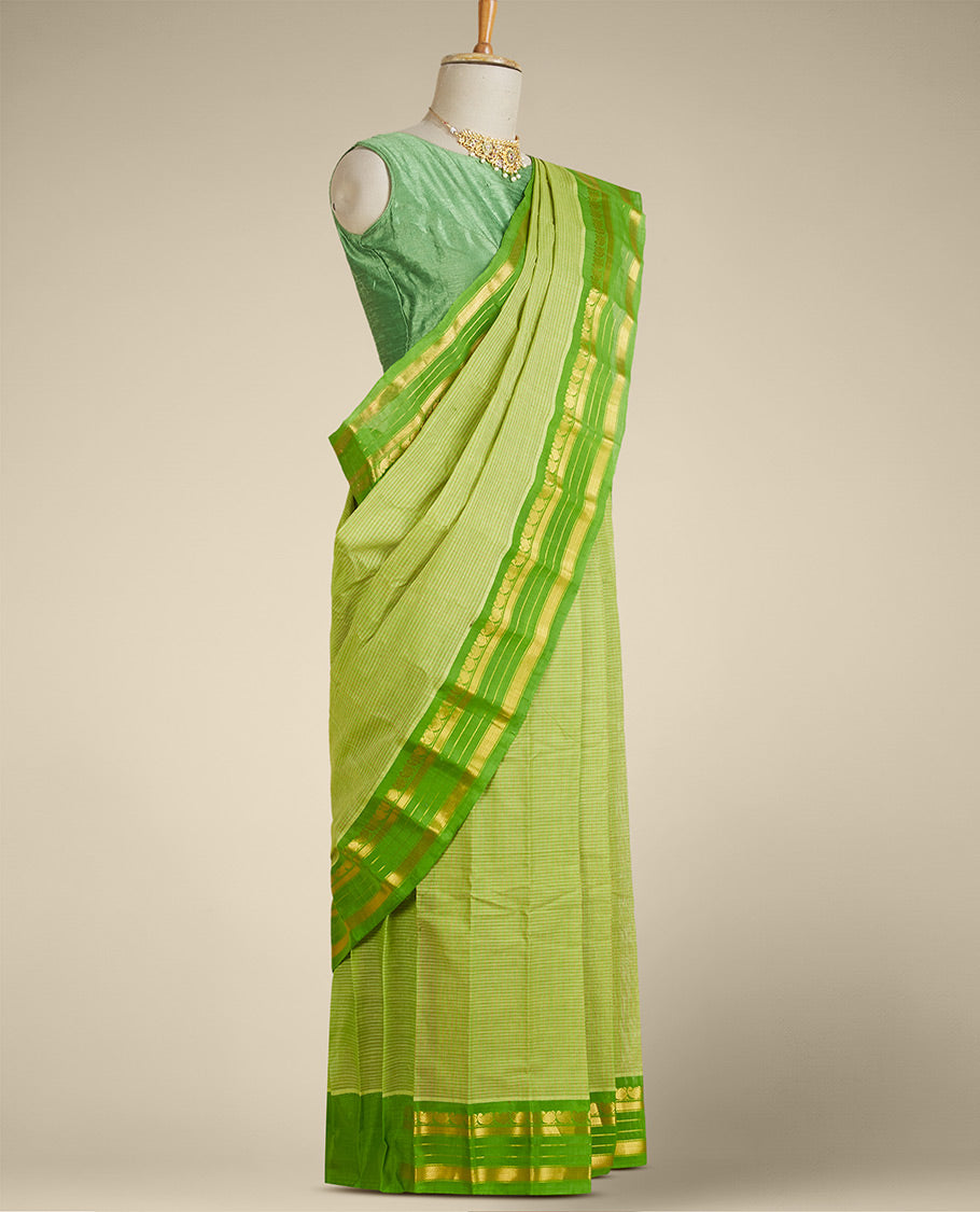 Light green micro-checked gadwal saree, contrast traditional design zari border & pallu of zari stripes