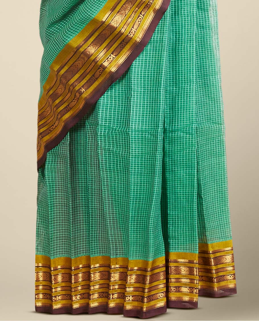 Green micro-checked gadwal saree, contrast border & pallu steeped with traditional zari designs