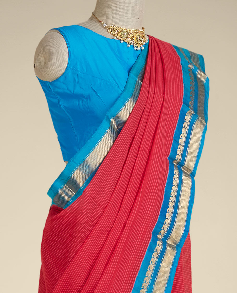 Red striped gadwal cotton saree, contrast zari border & pallu features floral design, paisley vine & stripes