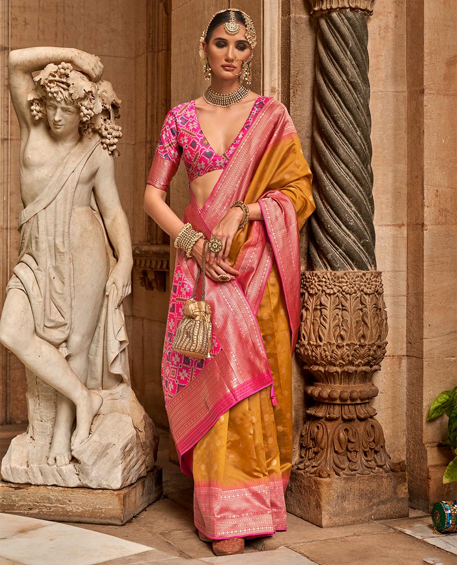Mustard chakram zari buttas designer catalog saree, contrast temple traditional zari border, and pallu of double ikkat patola weave