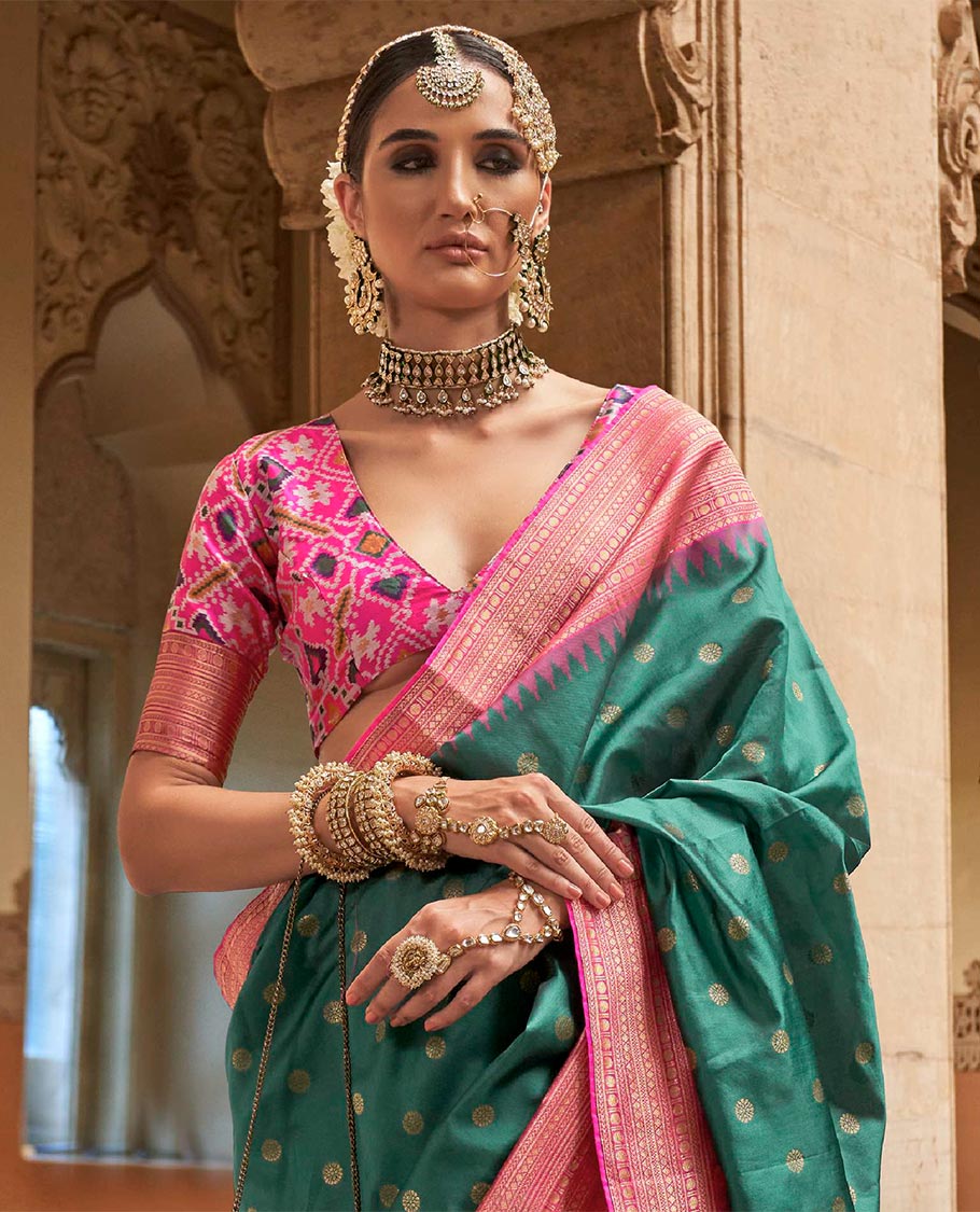 Green-red chakram zari buttas designer catalog saree, contrast temple traditional zari border, and pallu of double ikkat patola weave