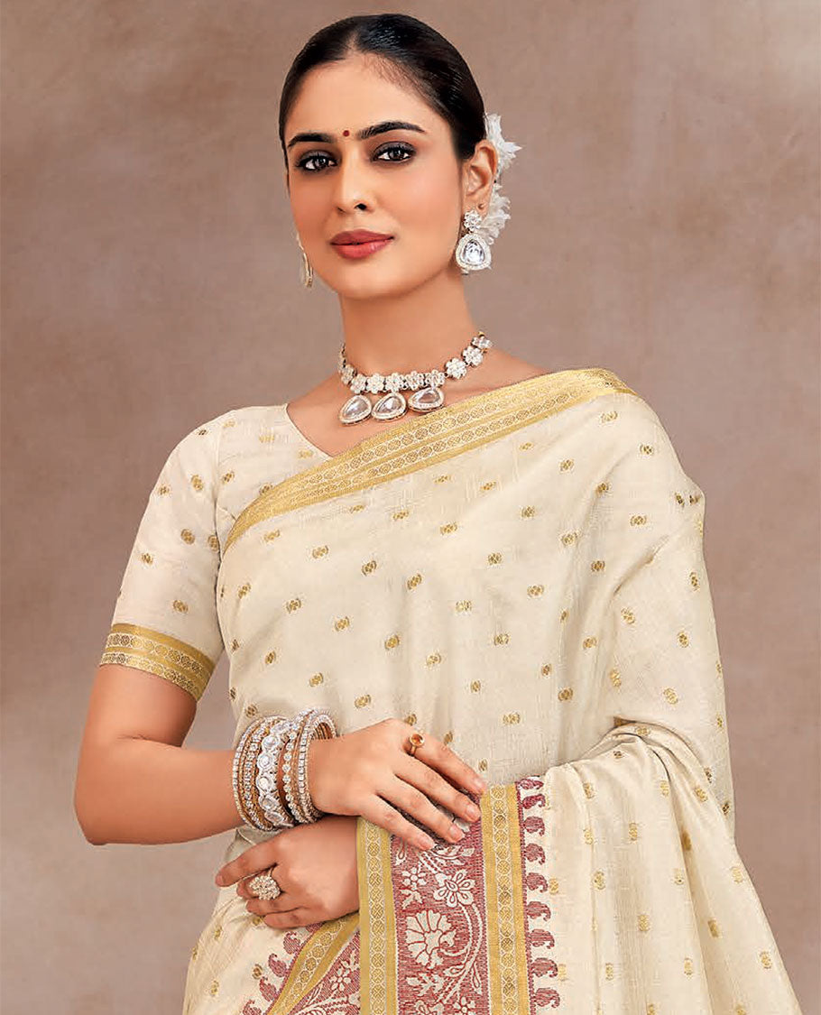 Cream buttas designer saree, floral creeper and paisley motifs border, and striped pallu