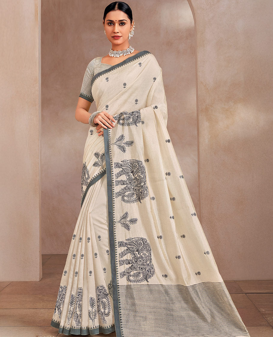 Cream buttas designer saree, elepjhant motifs border, and striped pallu