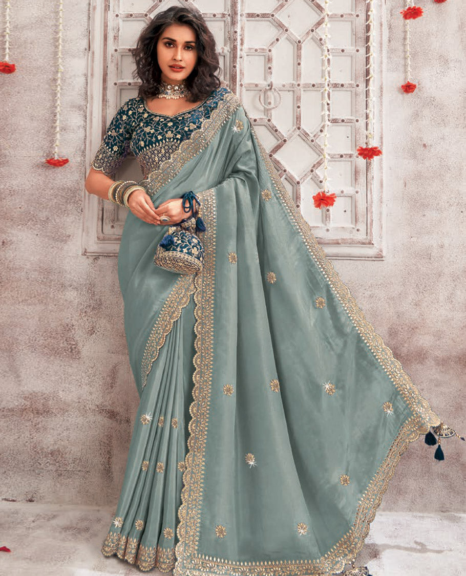 Blue floral stone embroidery designer catalouge saree with floral scallop border & embroidered readymade blouse