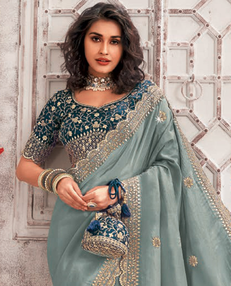 Blue floral stone embroidery designer catalouge saree with floral scallop border & embroidered readymade blouse
