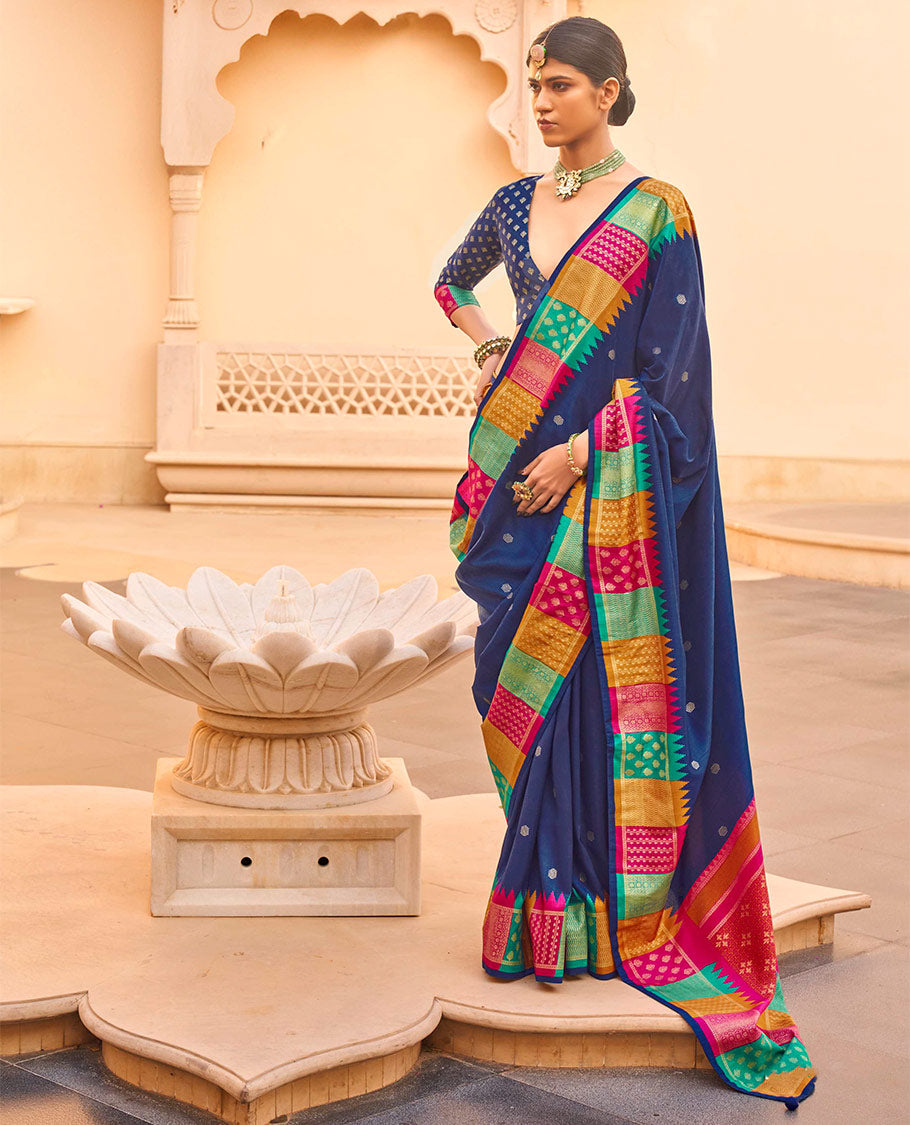 Navy Designer Saree, Bedecked with Buttas, Complemented by a Contrast Temple Multi-Color Butta Woven Border, Intricate Pallu, and a Matching Blouse