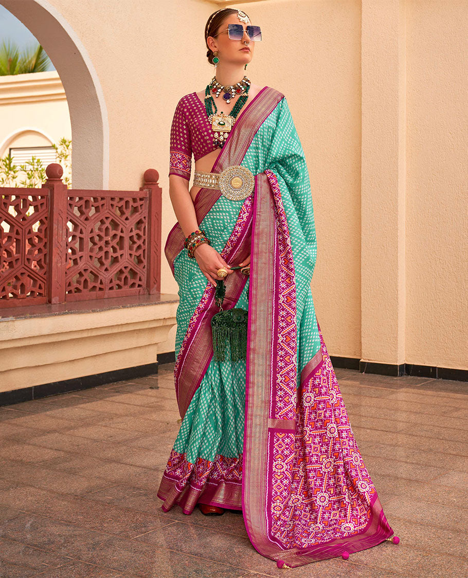 Turquoise-pink jaal patola designer catalog saree, contrast border and pallu of intricate patola weave