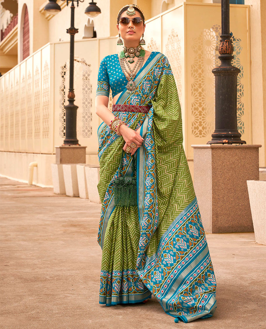 Green-blue patola chevron striped designer catalog saree, contrast diamond ikkat border, and pallu of diamond patterns