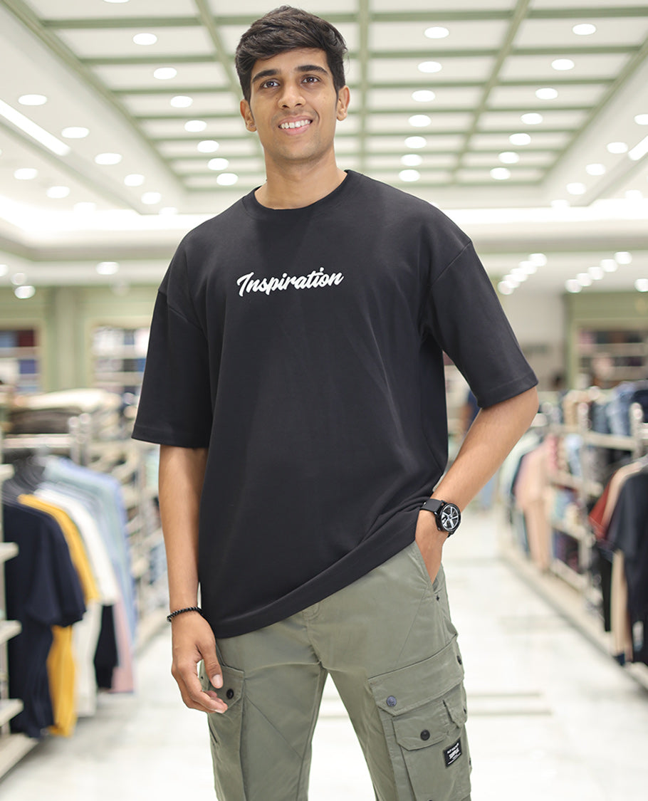 Black Glow in the Dark Cotton-Blended T-Shirt, Adorned with Colorful Cartoon Motifs Print, Comes with a Crew Neck, Half-Sleeves, Oversized Fit, and Long Length