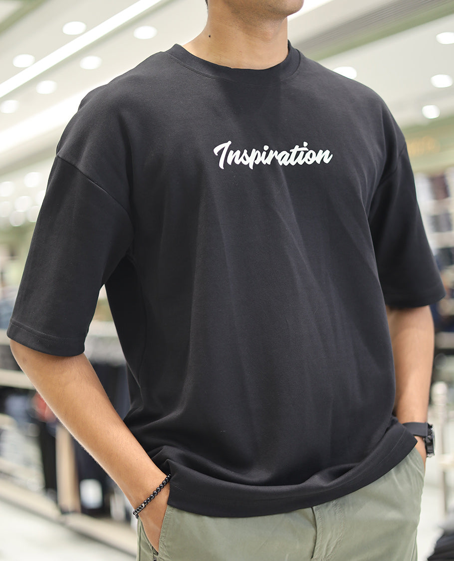 Black Glow in the Dark Cotton-Blended T-Shirt, Adorned with Colorful Cartoon Motifs Print, Comes with a Crew Neck, Half-Sleeves, Oversized Fit, and Long Length