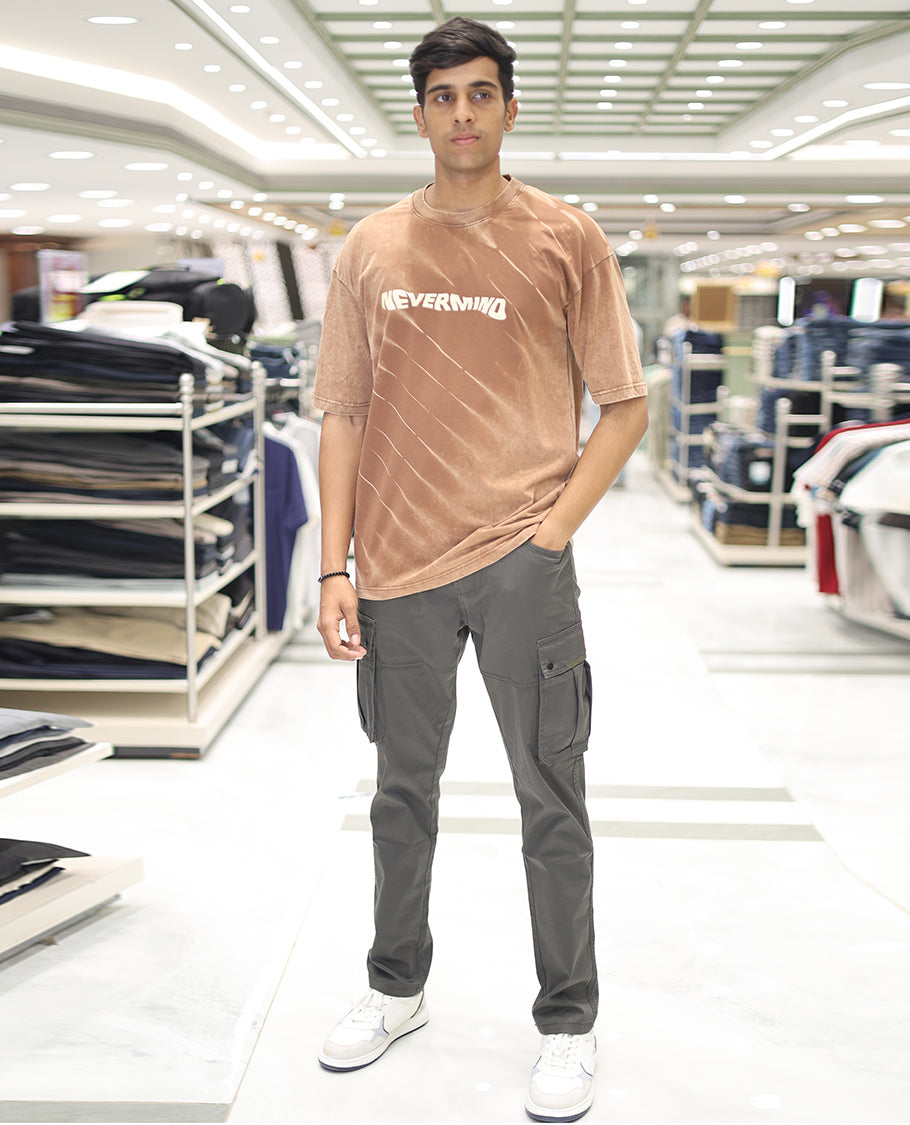 Brown Cotton-Blended T-Shirt, Adorned with Typography Print, Comes with a Crew Neck, Half-Sleeves, Oversized Fit, and Long Length