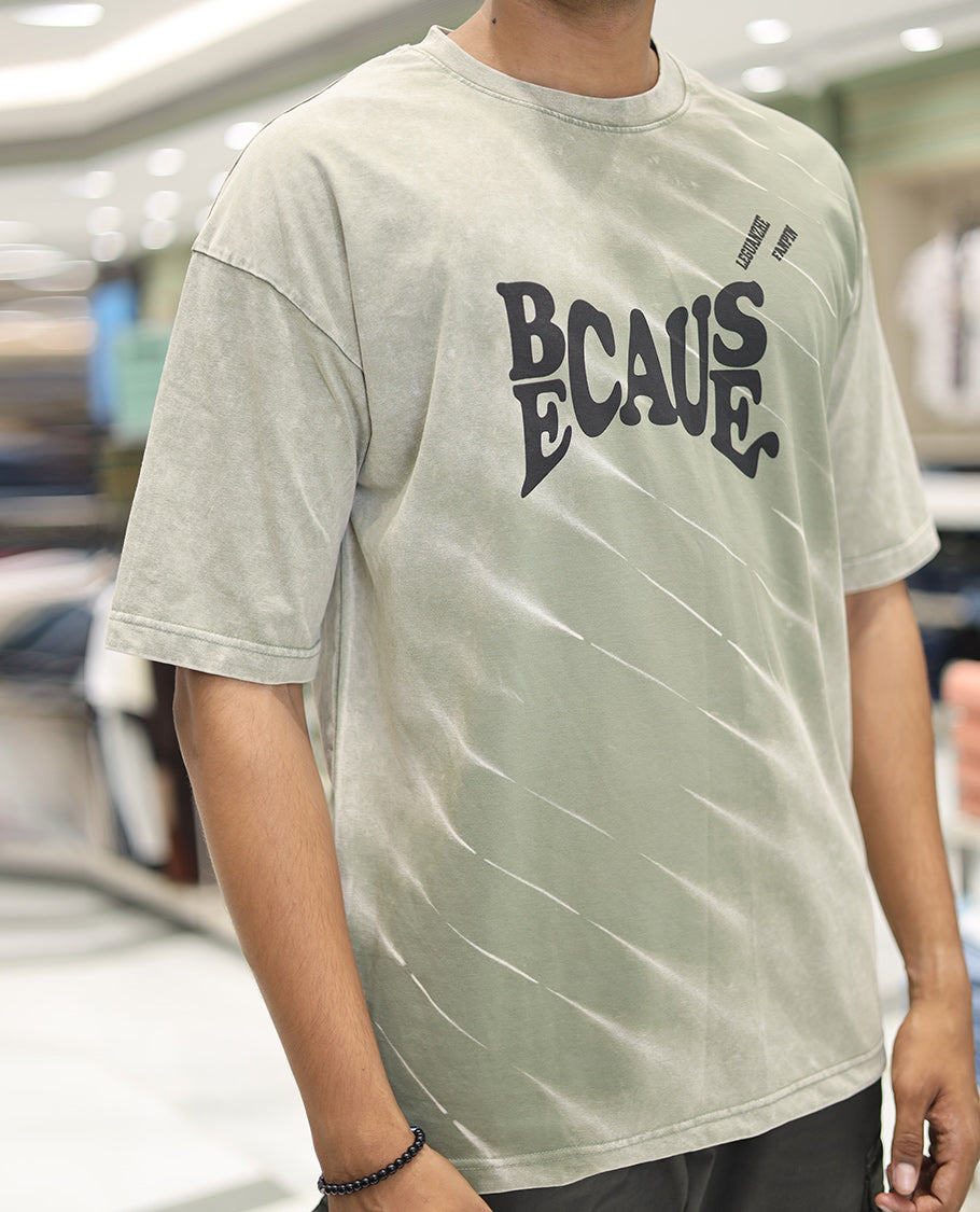 Olive Green Cotton-Blended T-Shirt, Detailed with Typography Print, Comes with a Crew Neck, Half-Sleeves, Oversized Fit, and Long Length