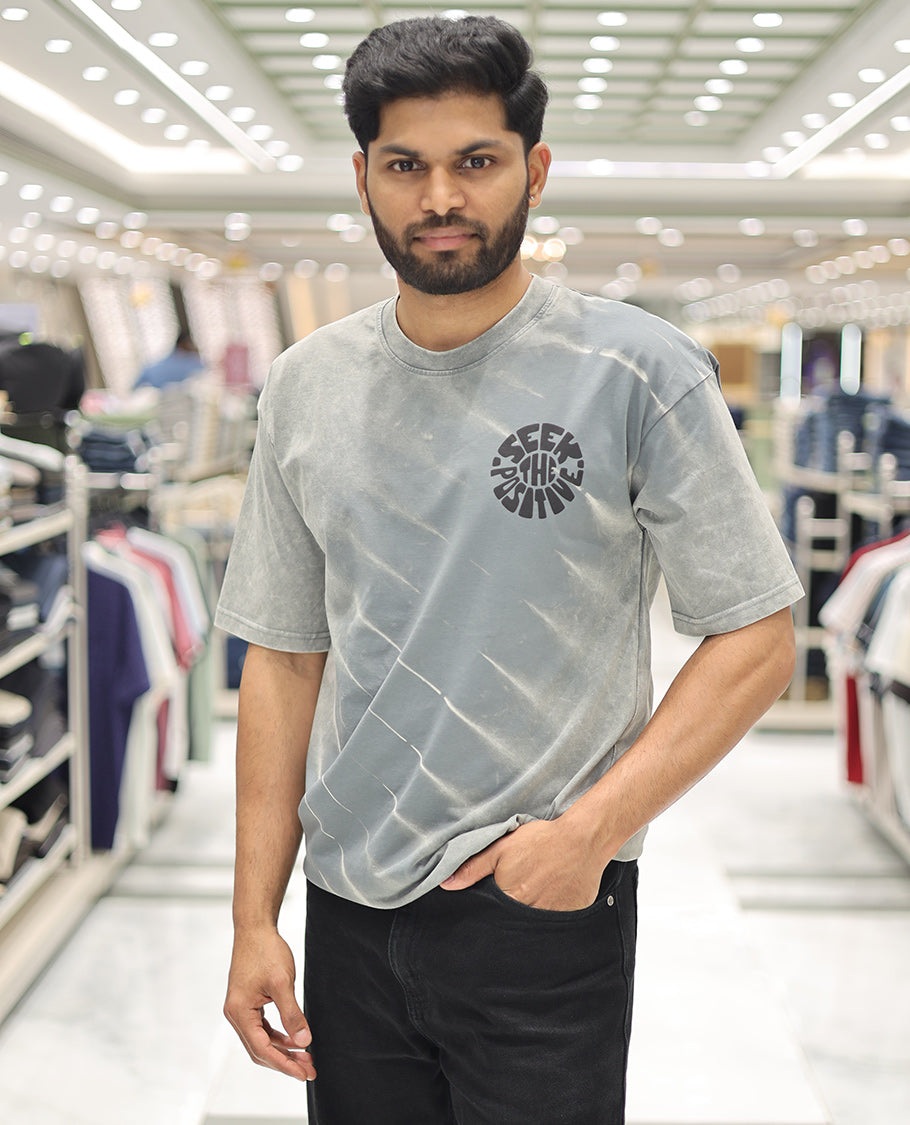 Green Cotton-Blended T-Shirt, Elevated with Typography Print, Comes with a Crew Neck, Half-Sleeves, Oversized Fit, and Long Length