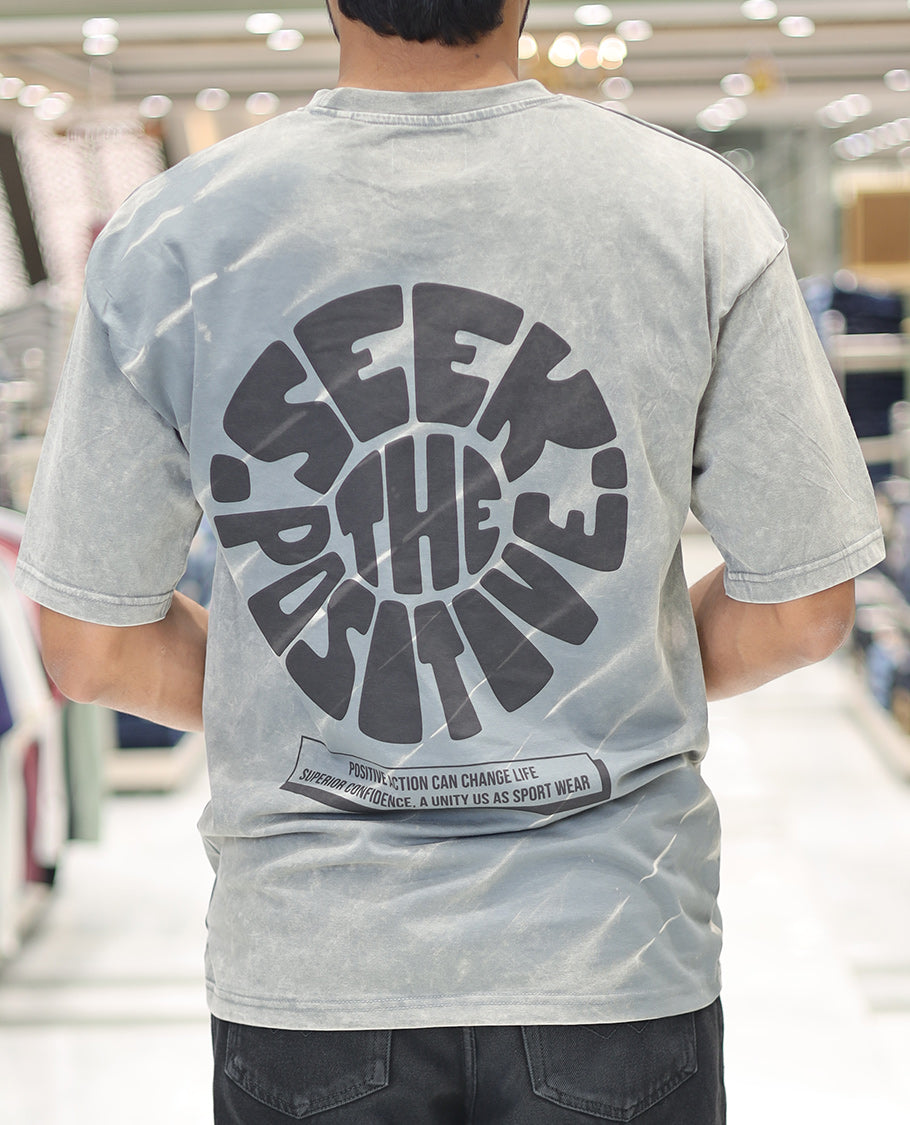 Green Cotton-Blended T-Shirt, Elevated with Typography Print, Comes with a Crew Neck, Half-Sleeves, Oversized Fit, and Long Length