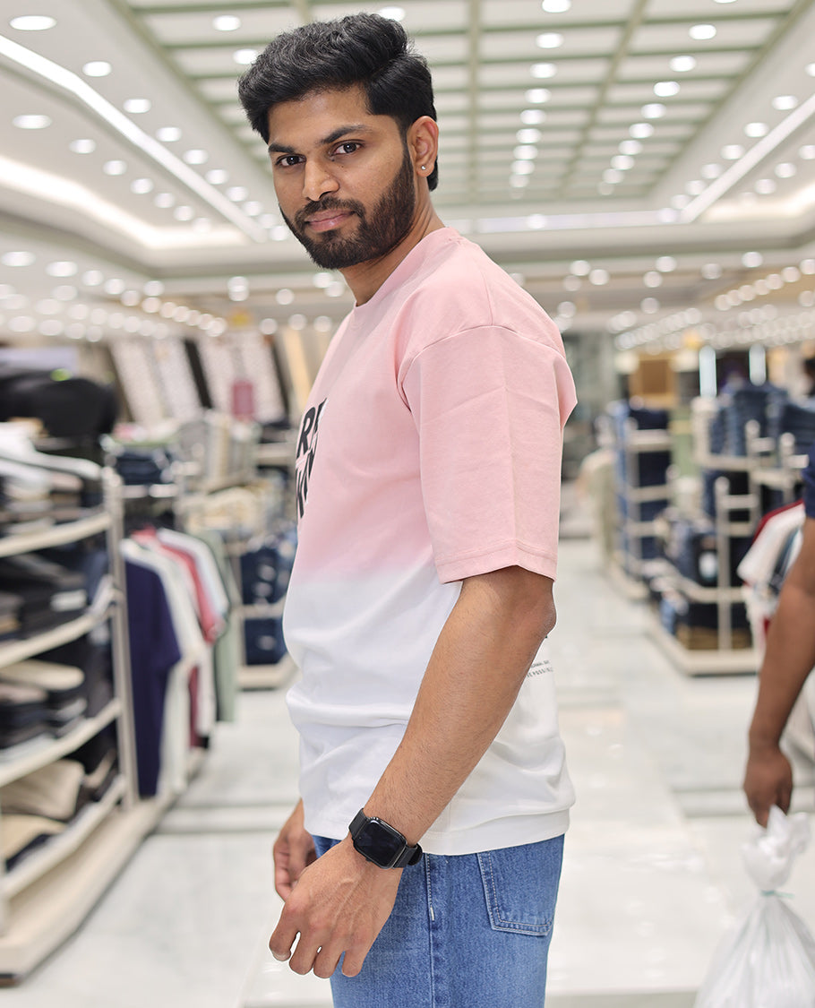 Pink Cotton-Blended Ombre T-Shirt, Artfully Detailed with Funky Motifs and Typography Prints, Comes with a Crew Neck, Half-Sleeves, Oversized Fit, and Long Length
