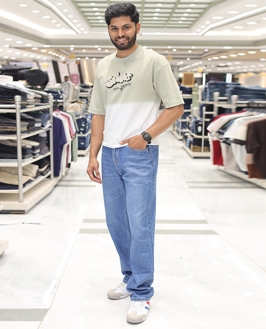 Green Cotton-Blended Ombre T-Shirt, Artfully Detailed with Funky Motifs and Typography Prints, Comes with a Crew Neck, Half-Sleeves, Oversized Fit, and Long Length