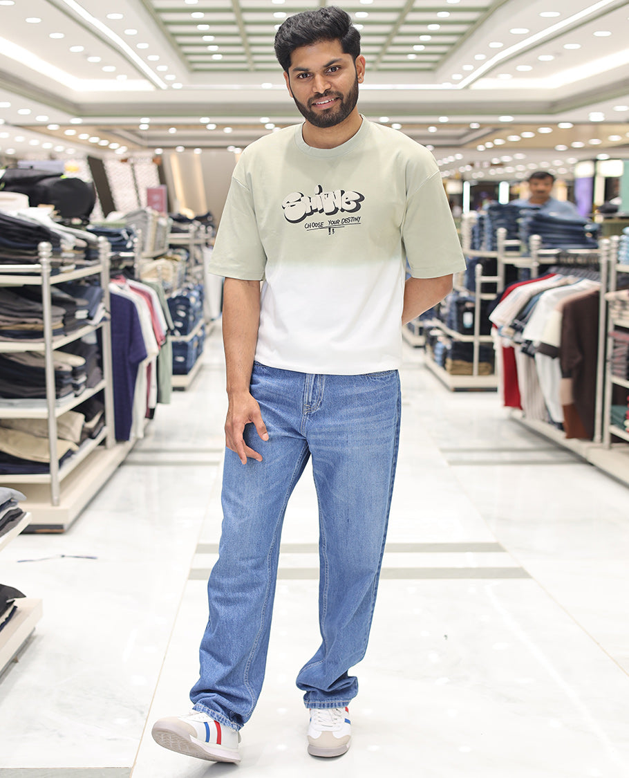 Green Cotton-Blended Ombre T-Shirt, Artfully Detailed with Funky Motifs and Typography Prints, Comes with a Crew Neck, Half-Sleeves, Oversized Fit, and Long Length