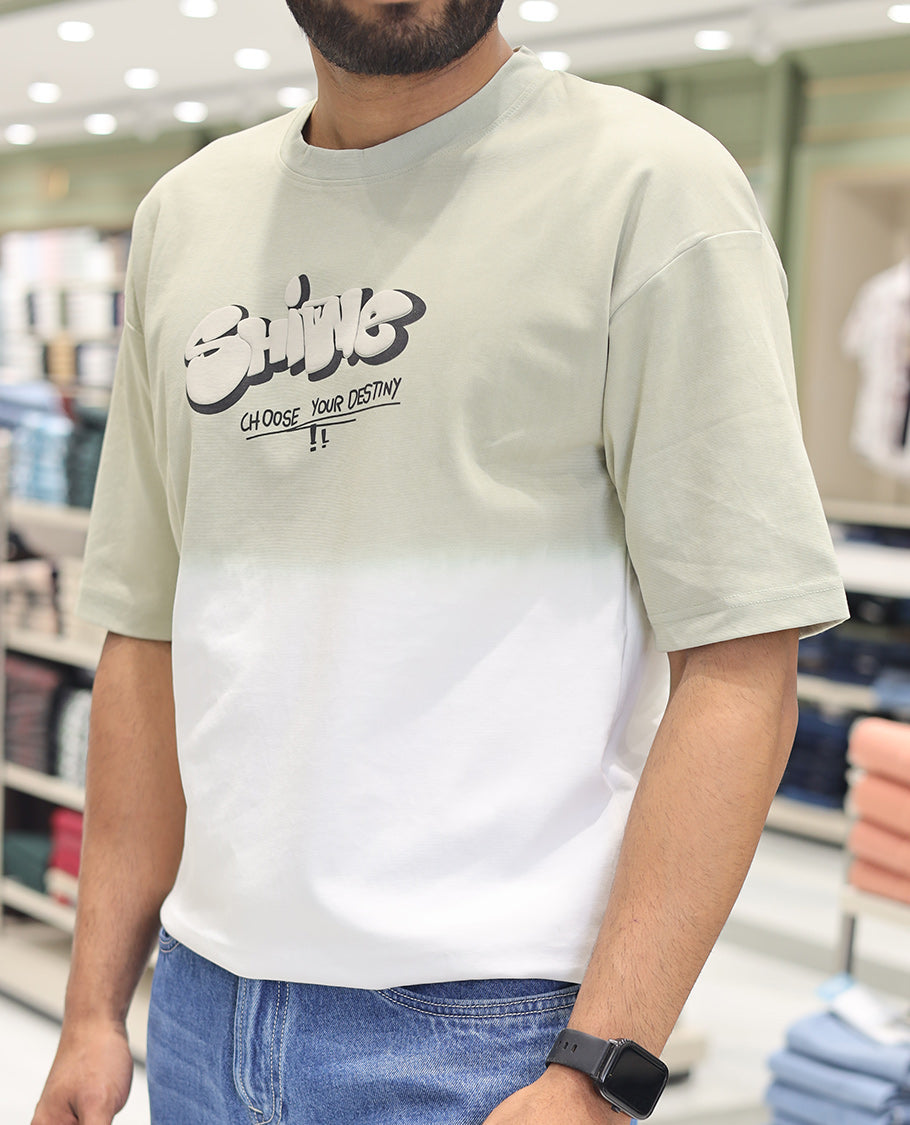 Green Cotton-Blended Ombre T-Shirt, Artfully Detailed with Funky Motifs and Typography Prints, Comes with a Crew Neck, Half-Sleeves, Oversized Fit, and Long Length